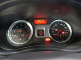 a close up of the dashboard of a car with the lights on