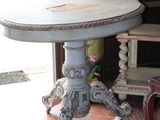 a small table and a chair in a room