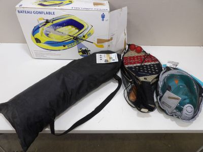 a black umbrella and a black bag on a white table