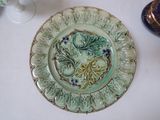 a plate with a decorative design on it on a table