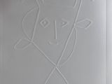 une photo d'un dessin représentant un chien sur une feuille de papier