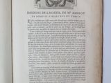 an open book with a picture of a clock on it