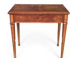 an old wooden table with a drawer on top of it