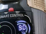 a close up of a smart control button on a blender