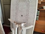 a chair that is sitting in the middle of a room
