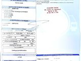 a close up of a car registration form on a car seat
