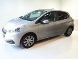 a picture of a silver car parked in a white room