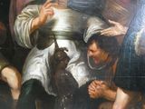 un tableau représentant un homme tenant un chien sur ses genoux