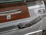 a close up of a car door handle and dash panel