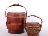 two wooden containers with handles and handles sitting next to each other