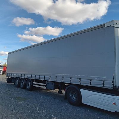 a white truck that is parked in a lot