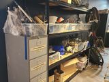 a garage with a lot of clutter on the shelves