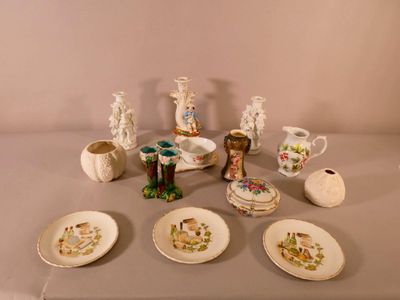 a table with a lot of plates and vases on it