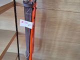 a pair of skis hanging on a rack in a store