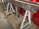 a long table that has a lot of red plastic on it