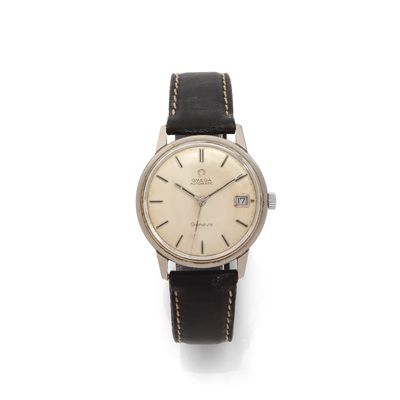 a close up of a watch on a white surface with a white background