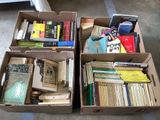 many books in the boxes on the floor