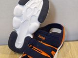 a close up of a pair of shoes on a table