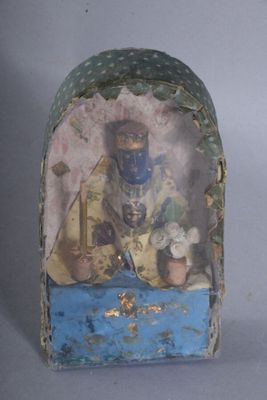 a small box with a picture of a man inside of it