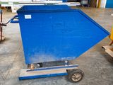 a blue container sitting on a dolly in a warehouse