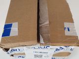two cardboard boxes stacked on top of each other on a white surface