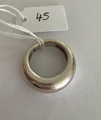 a silver ring with a tag attached to it