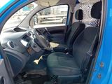a picture of a blue van with black leather seats