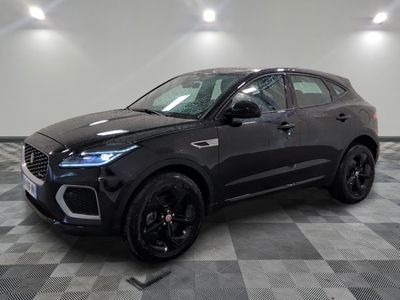a black 2020 jaguar pace pace is parked in a garage