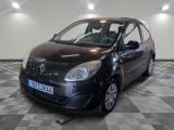 a picture of a small black car parked on a checkered floor
