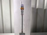 packaging of a dysonon vacuum on a white table