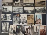 many old photographs of different buildings and buildings on the wall