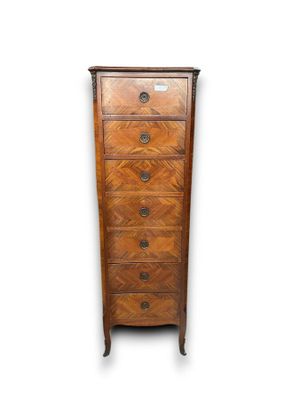 a wooden chest of drawers with drawers on each side