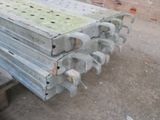 several pieces of metal are stacked on top of each other in a pile