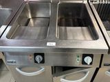 two stainless steel sinks in a commercial kitchen