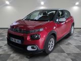 the red citrole is parked on a checkered floor