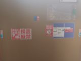 an image of a refrigerator with stickers on it