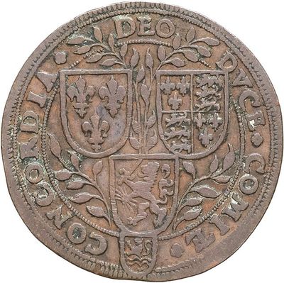 a close up of a coin with a coat of arms on it