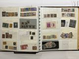 an open book with a lot of stamps on it