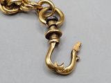 an image of a gold chain with a hook attached to it