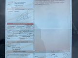 a picture of a driver ' s license on a car