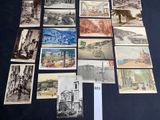 a lot of old postcards on display on a table
