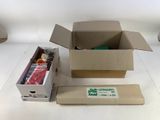 a cardboard box that has a bunch of items inside of it