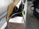 a box that is sitting on a table next to a printer
