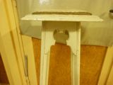 a small table with a mouse on top of it
