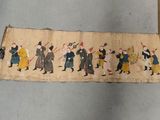 a long piece of cloth with a picture of people on it