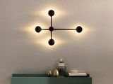 an image of a wall mounted light fixture in a living room
