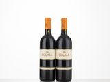 two bottles of red wine sitting on top of a table