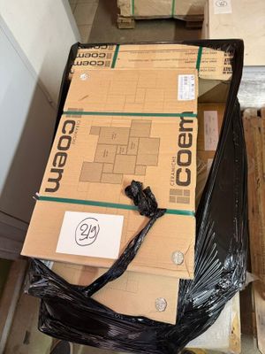 a pile of boxes sitting on top of a carton