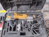 a tool in the case that is sitting on the floor
