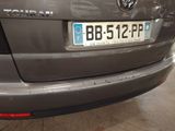 a car that has a license plate on the back of it